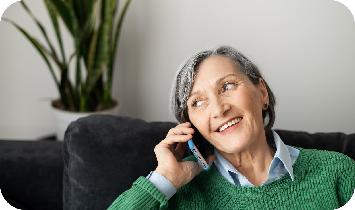 A senior woman making a phone call