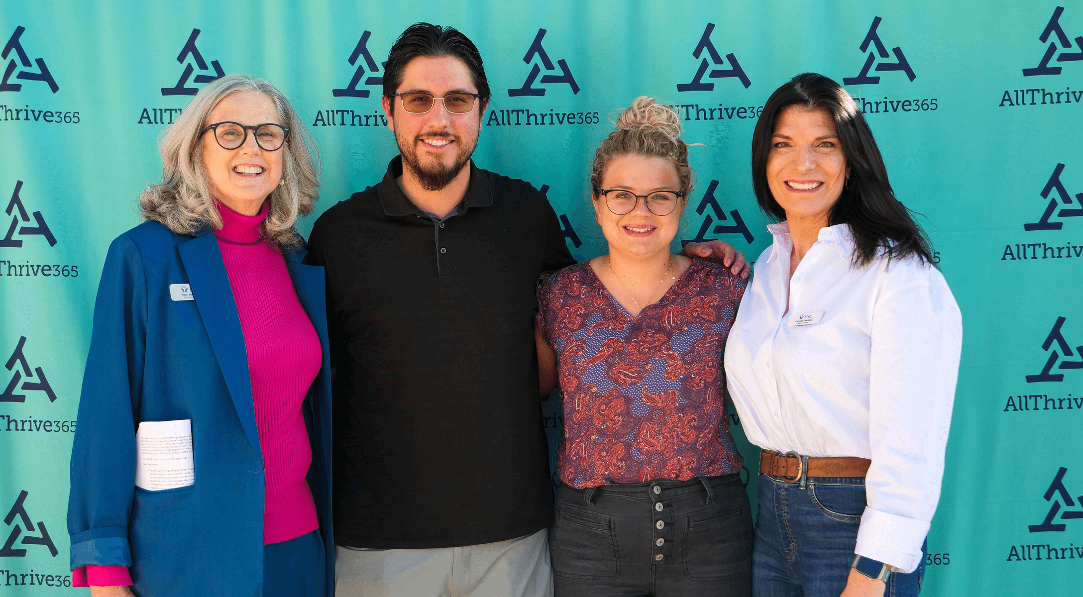 A group of staff posing for a group photo