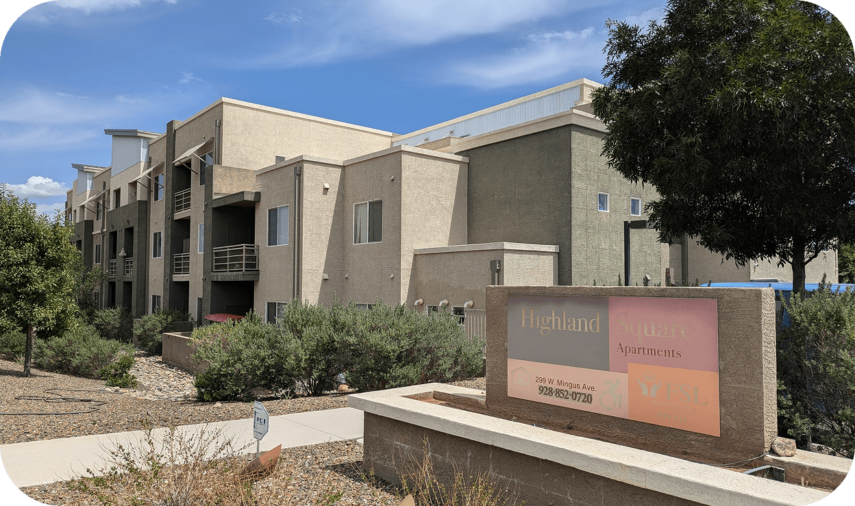 exterior of a multi-story apartment complex building