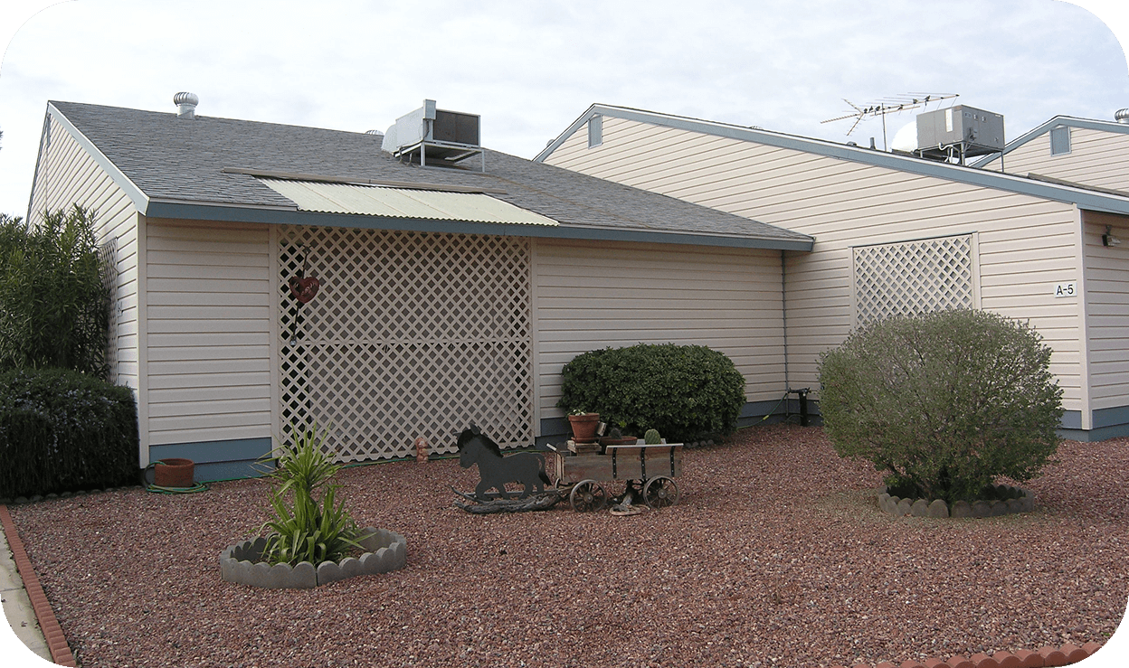 Exterior of a single level apartment home's front yard